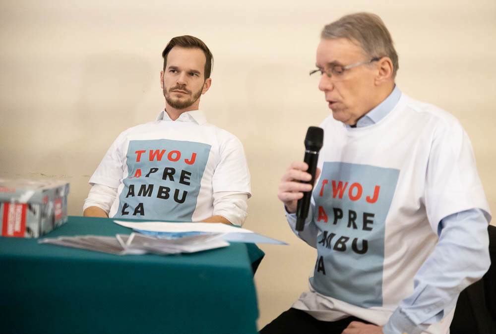 Tomasz Ponik�o, Henryk Wo�niakowski