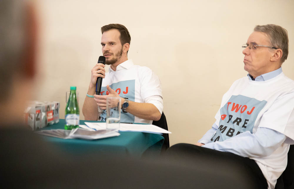 Tomasz Ponik�o, Henryk Wo�niakowski